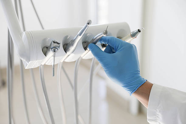 Professional Tooth Extraction technician working in Calhoun City, MS
